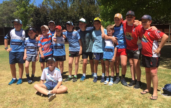 Young Boars attend rugby camp at UNE
