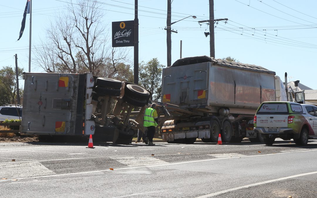 B-double hits train bridge and truck rolls