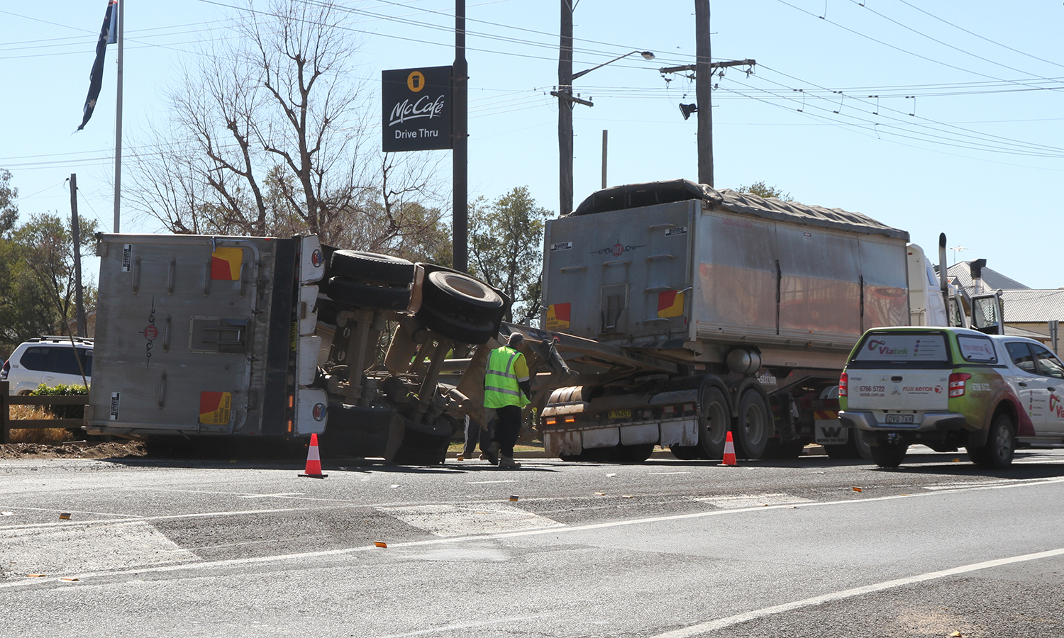 B-double hits train bridge and truck rolls