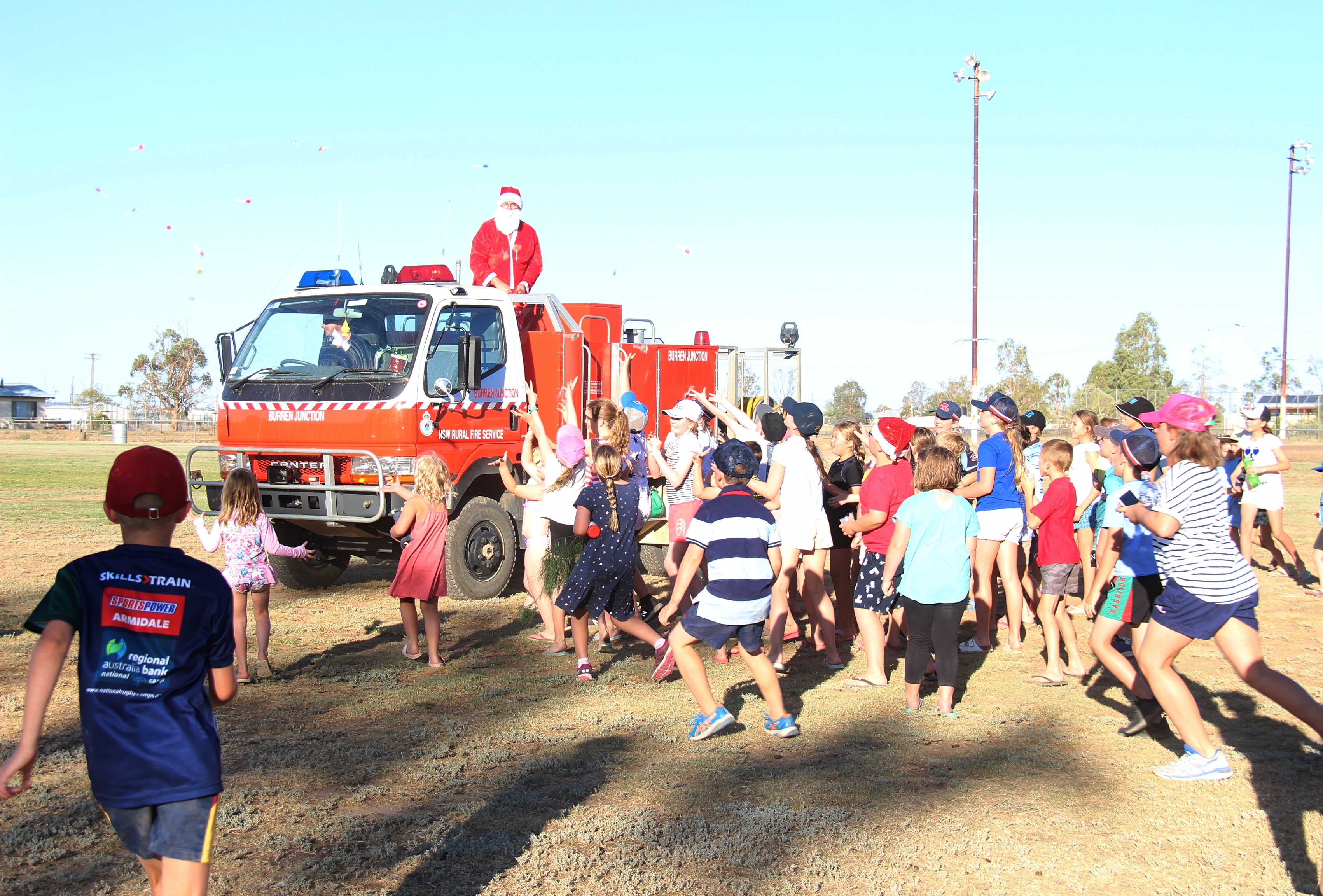 A highlight of the day was Santa Claus arriving in Burren Junction. The big man in red arrived on board the RFS fire truck driven by RFS member Christian Powell. Santa distributed lollies to the children with the help of Senior Constable Paul Matts.