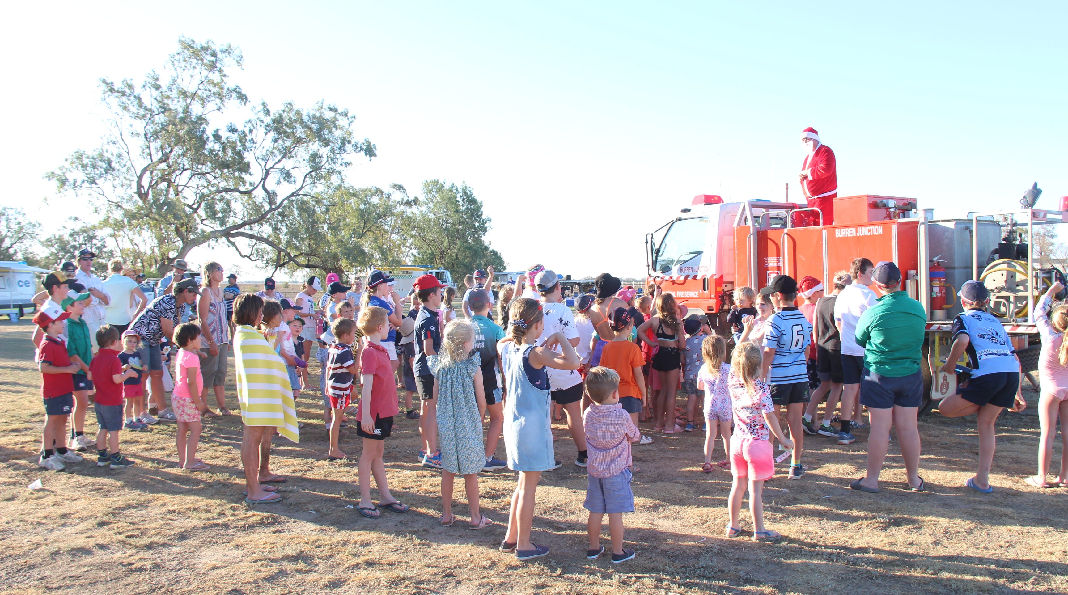 A highlight of the day was Santa Claus arriving in Burren Junction. The big man in red arrived on board the RFS fire truck driven by RFS member Christian Powell. Santa distributed lollies to the children with the help of Senior Constable Paul Matts.