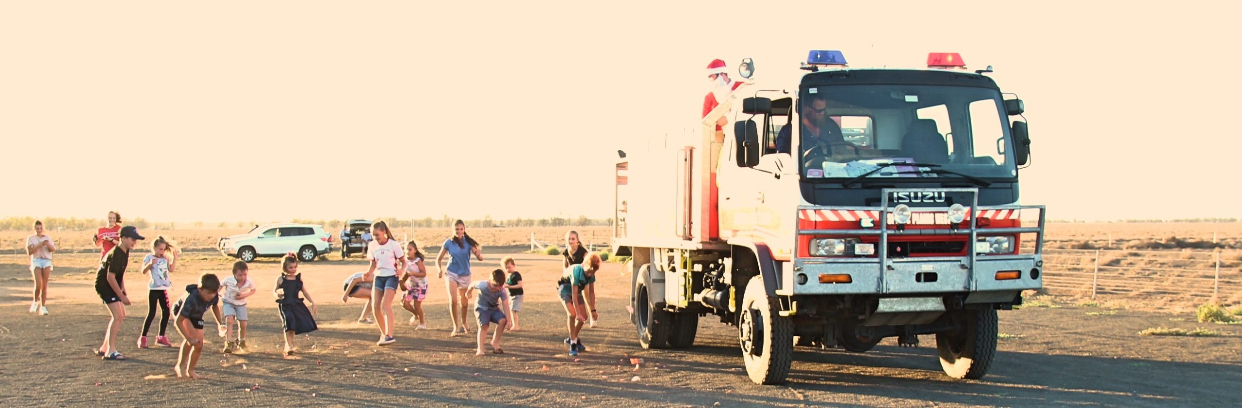 Santa arrived on the Spring Plains West fire truck and did a lolly throw much to the delight of the children.