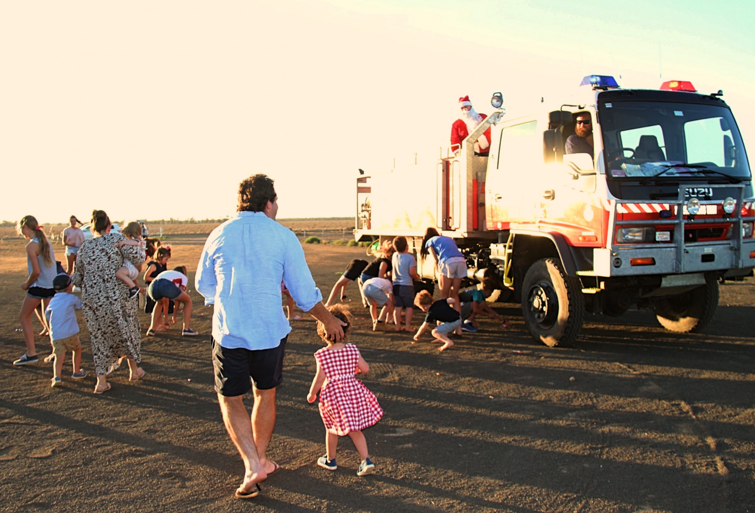 Santa arrived on the Spring Plains West fire truck and did a lolly throw much to the delight of the children.