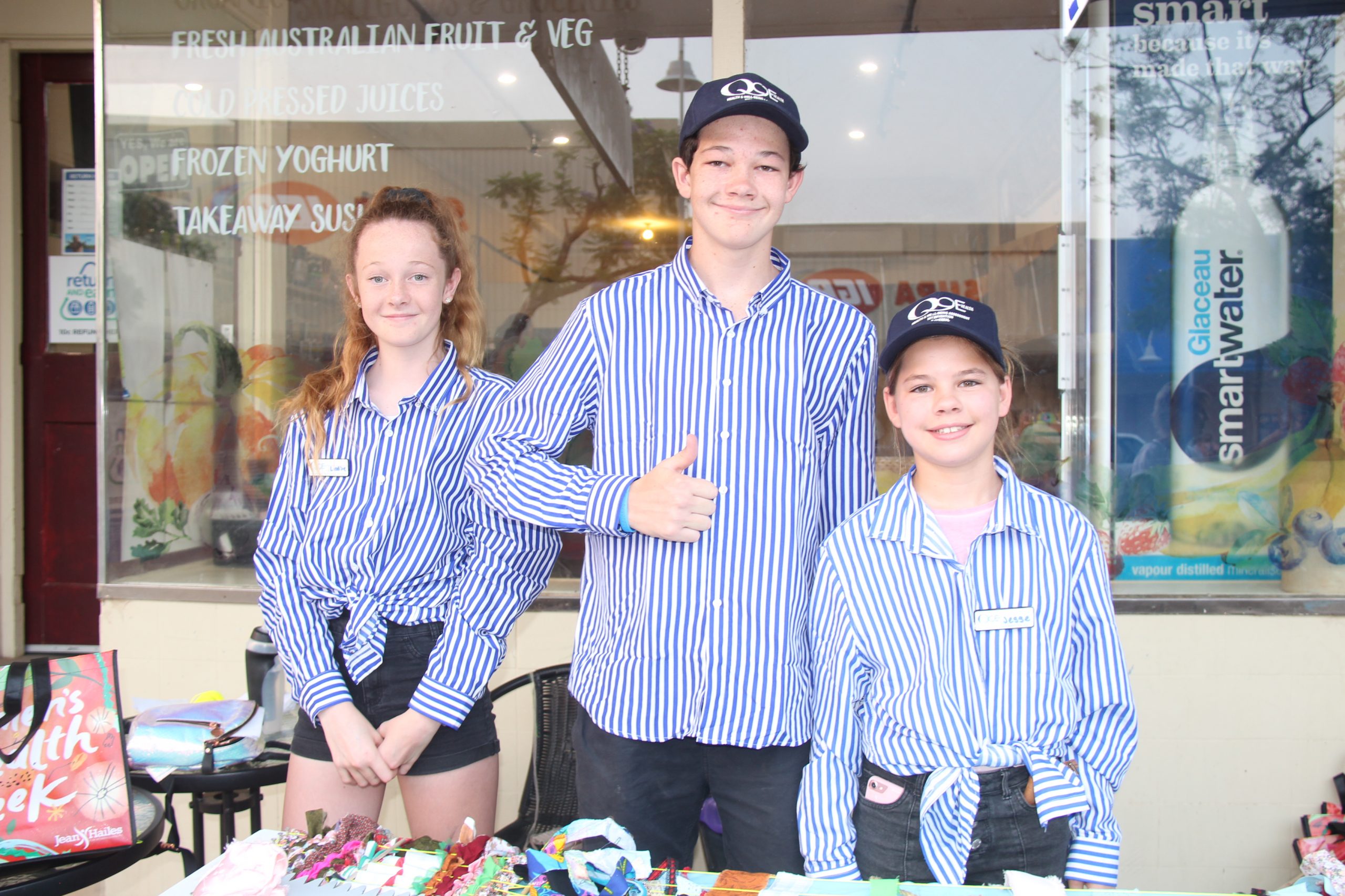 Lindsie Lonnen, Jordan Lonnen and Jesse Montgomery at the Long Table Weave stand.