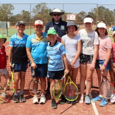 Young tennis aces brace the summer heat at school holiday clinic