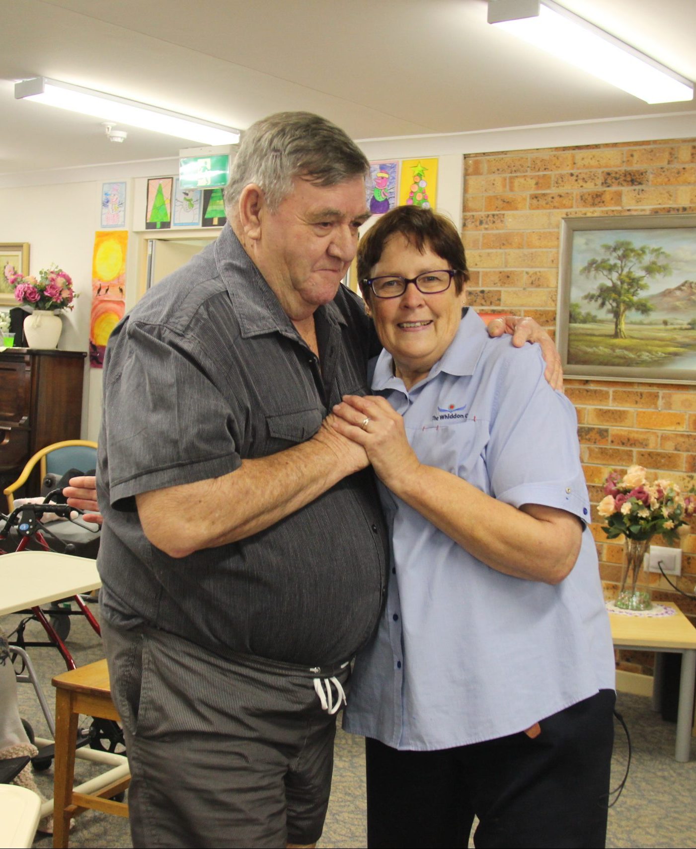 The Whiddon Group - Weeronga resident Leslie Collins and recreational activities officer Liz Berger dancing at an event in 2018.