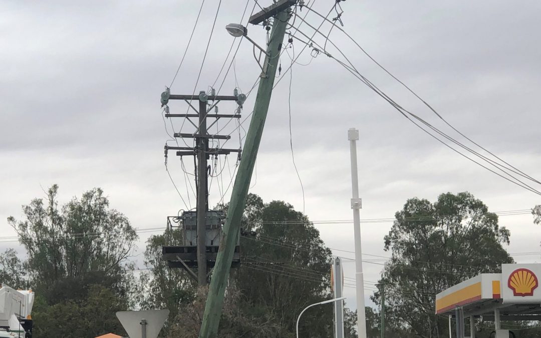 Power pole down and police raid at Carroll