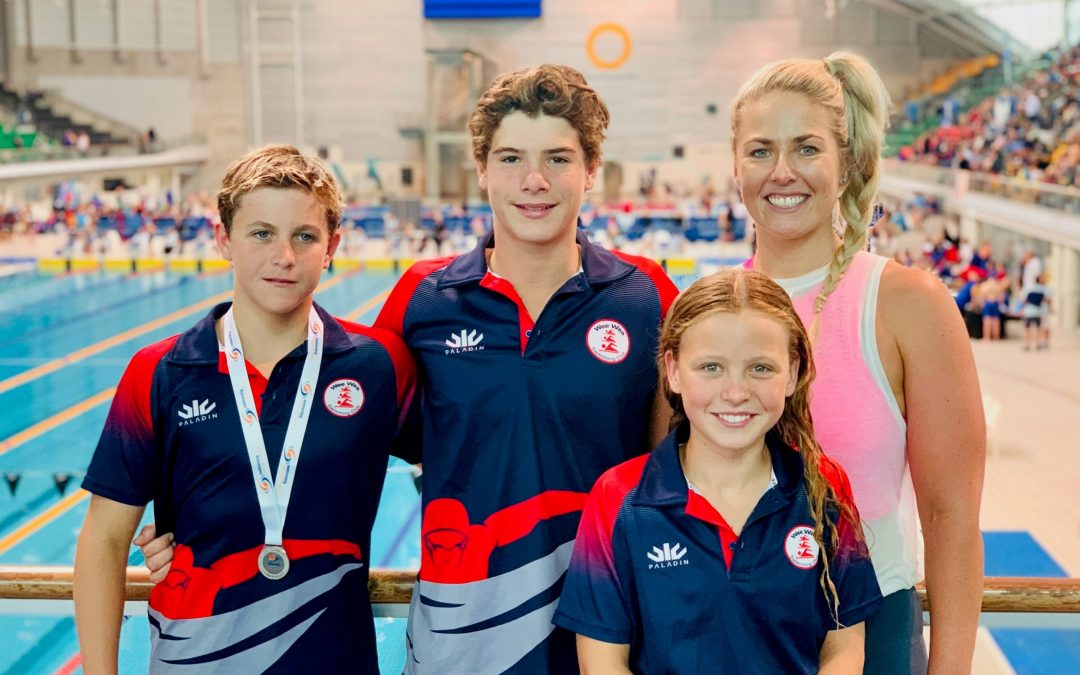 Karla’s Swim Team trio make their coach proud at Country Champs