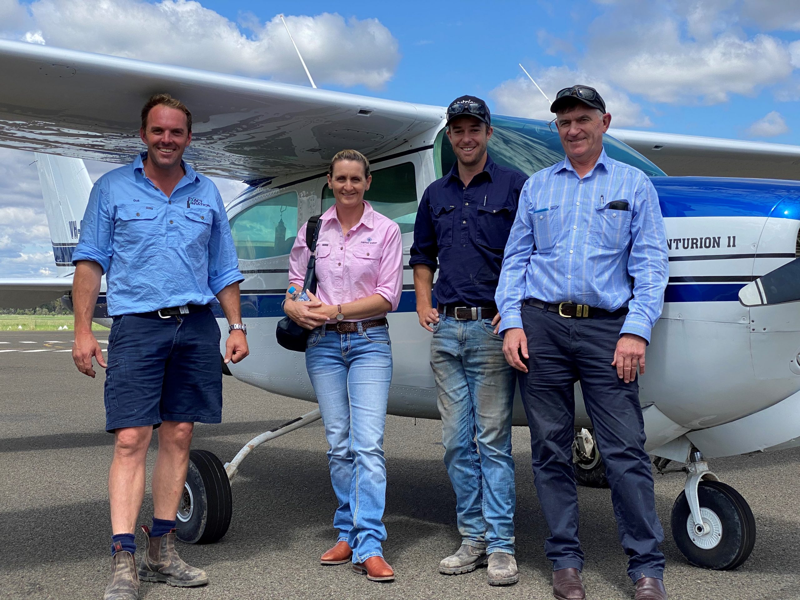 Exact Aviation owner and pilot Angus Ashby, farmer and Namoi Water executive officer Jon-Maree Baker, Merah North farmers Joel McBride and Jono Phelps.
