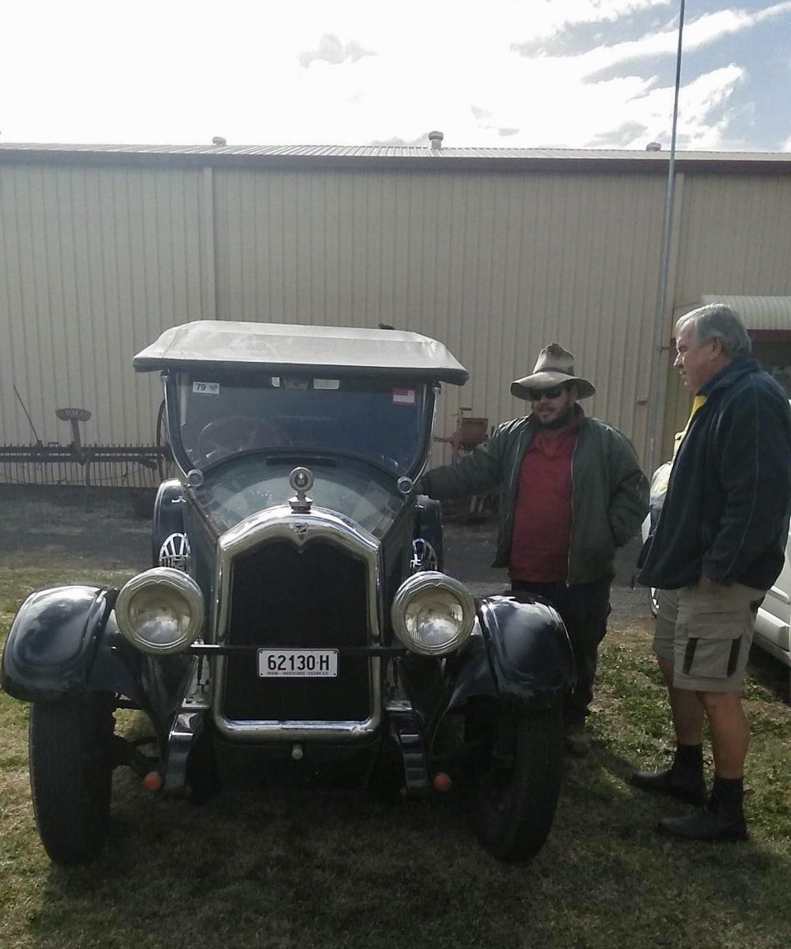 Matt Copelin and Ron Lowder admiring a 1927 Buick.