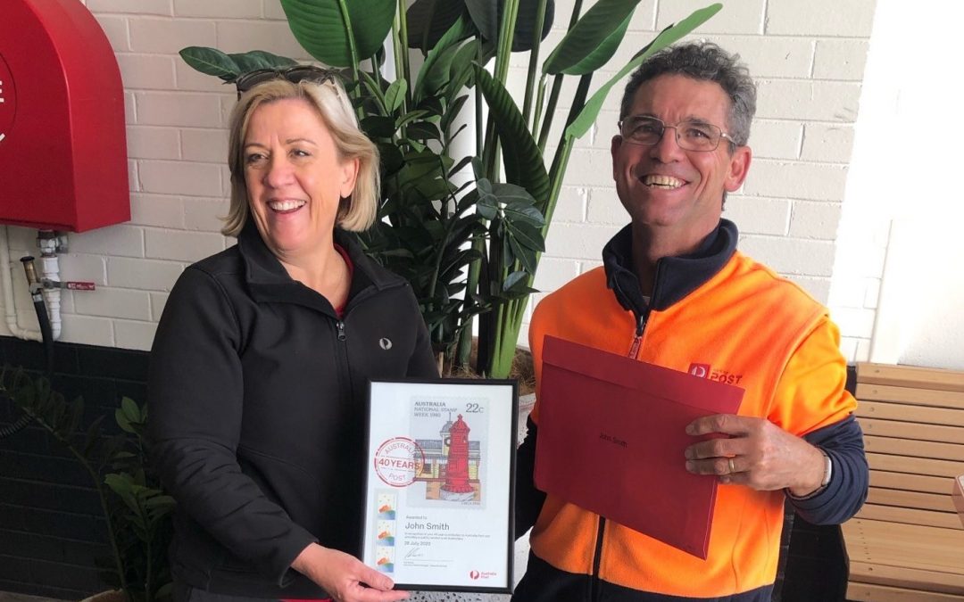 Postie John Smith celebrates milestone following 40 years service to community