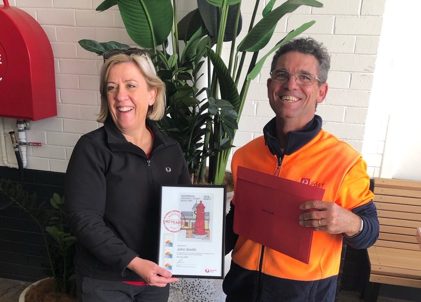 Postie John Smith celebrates milestone following 40 years service to community