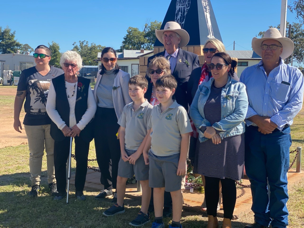 Back, left to right, at the Pilliga commemoration, Brittney Phillips, Betty Galagher, Casey Zell, Wayne Galagher, Donna Phillips, Max Phillips, middle, Sally Phelps, Donna Irene Phillips, front, twins Zac and Nigel Phillips.