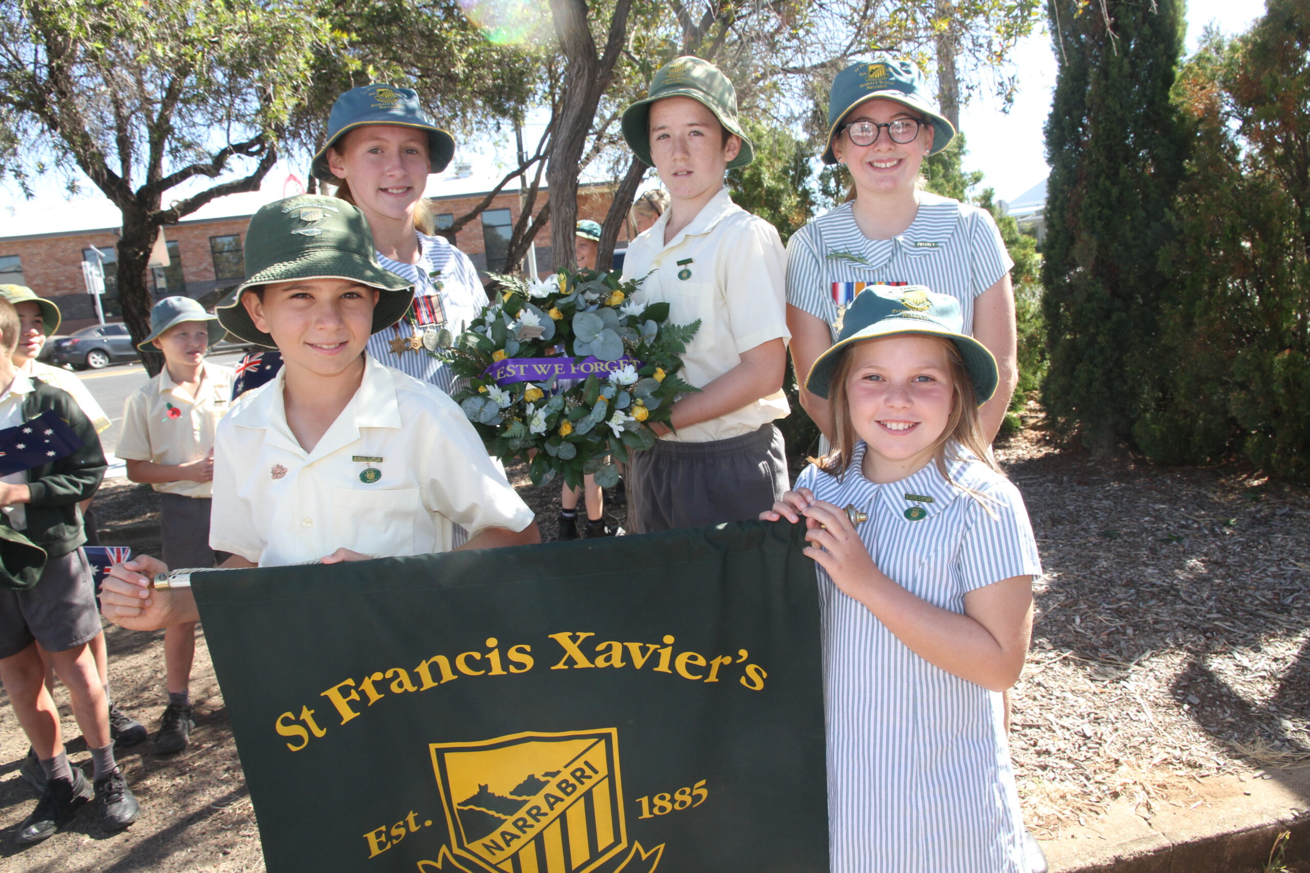 St Francis Xavier’s marchers, back, Aleira Sunderland, Gabe O’Connor, Tilly Gleeson, front, school captains Patrick Campbell and Charlie Tout.