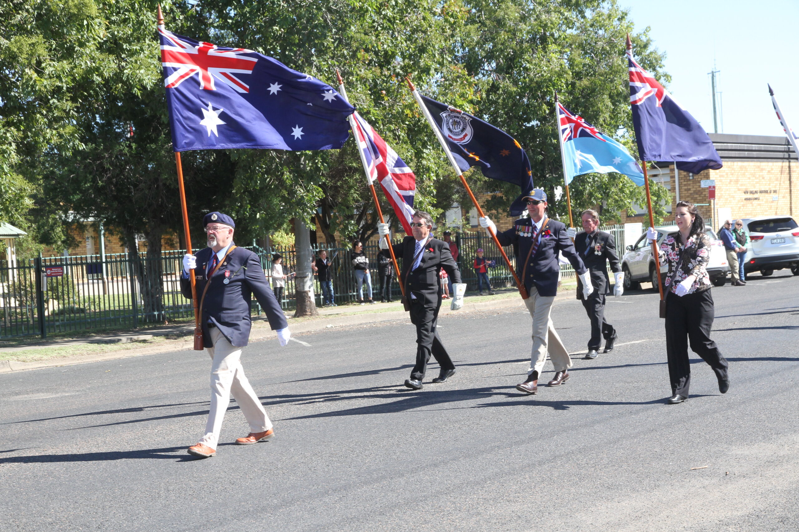 The march sets off led by Graham Thomas, Michael Peterson, Scott McCarron, Jacinta Peate and back, David Peate.