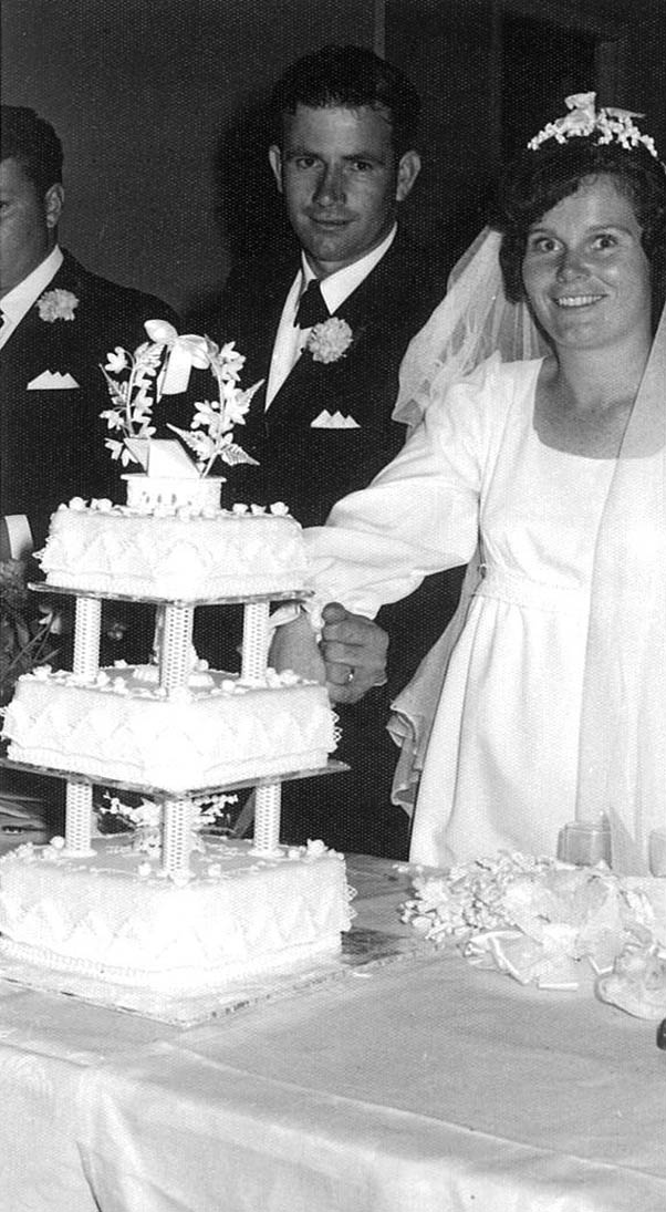 Fred and Irene Baldwin cutting their wedding cake in 1971.