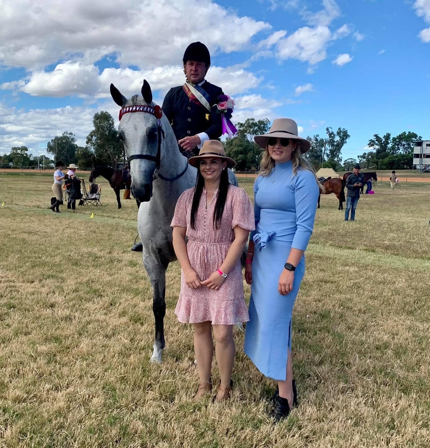 Aubrey Tribe Memorial supreme rider was awarded to Damien Judd. He is with judges Nadine Finney and Katrina Gorman.