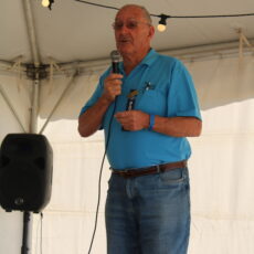 Max Pringle OAM recites a poem during poet’s corner.