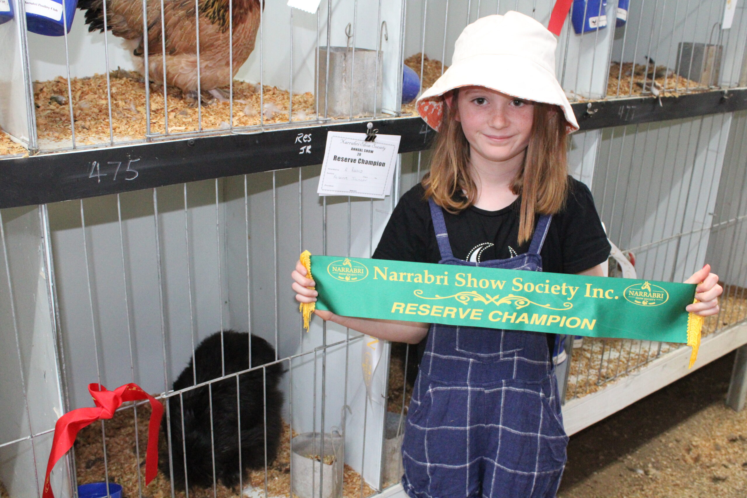 Aida Renaud with her silky named Ace which was reserve champion in the junior section of the poultry pavilion.