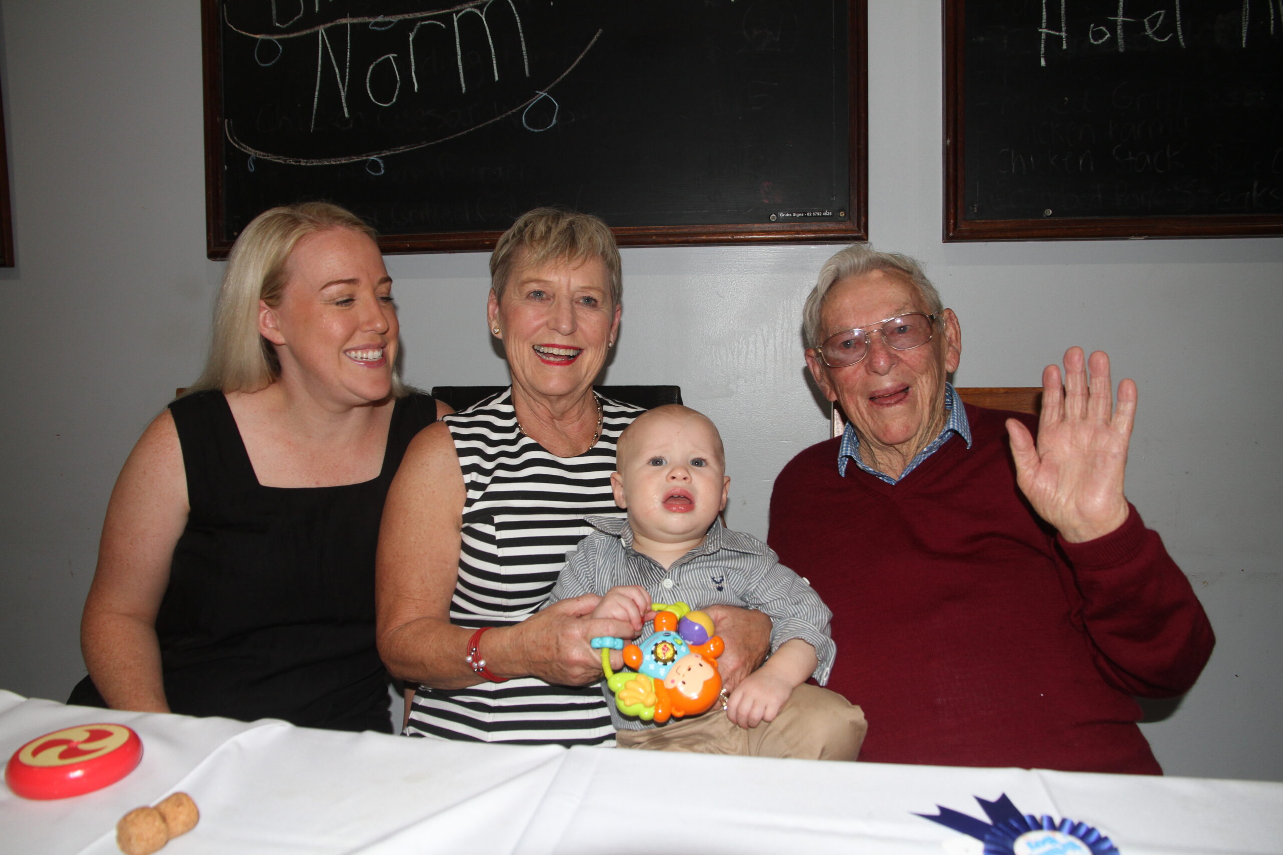 Four generations: Grandaughter Anna and daughter Helen Dugdale with Norm’s grandson Angus Ryan and Norm Chapman.