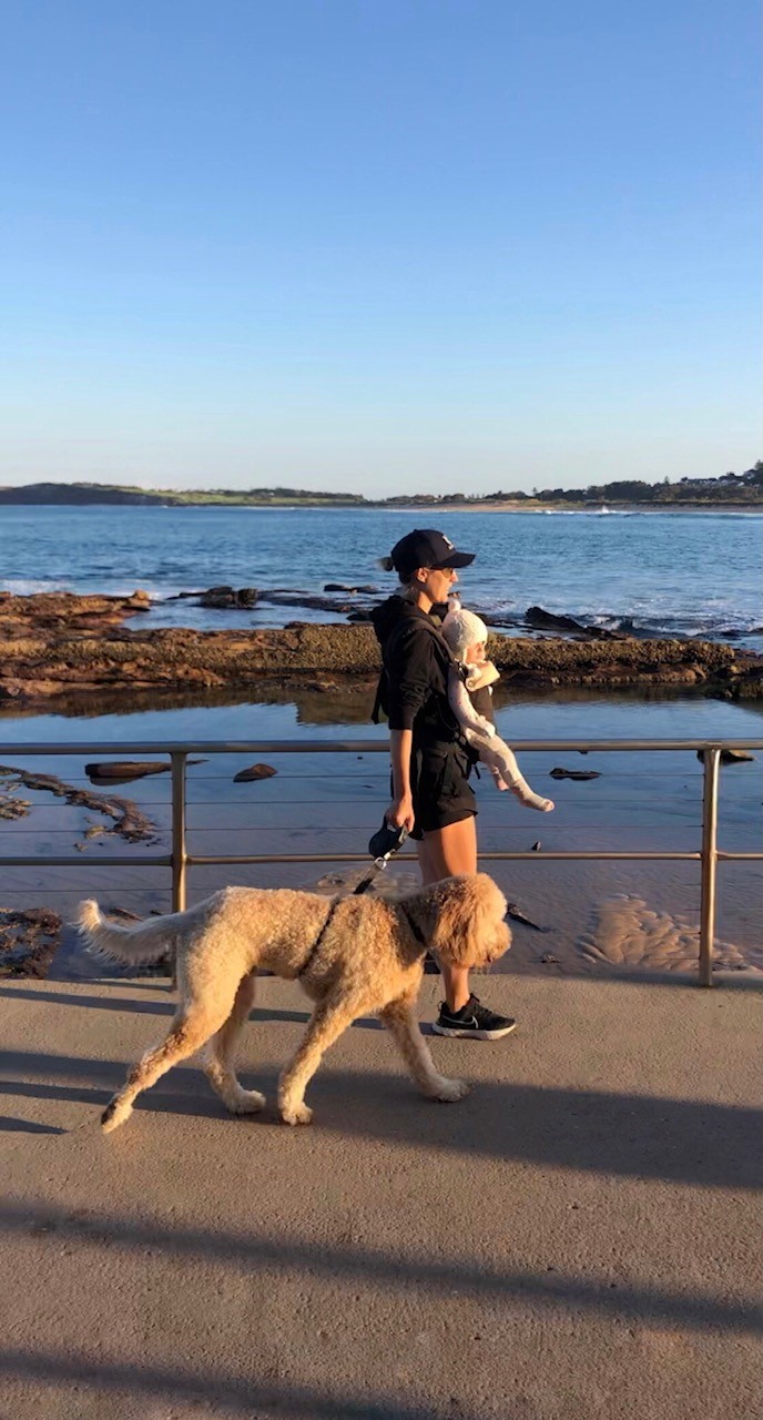 Julia Carroll with Aurora and their dog, Gary.