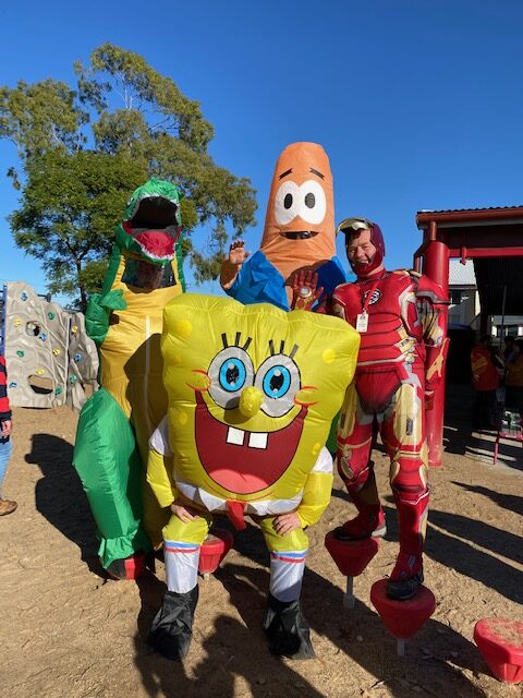 Back, dinosaur, Patrick, Stuart Black and, front, SpongeBob.