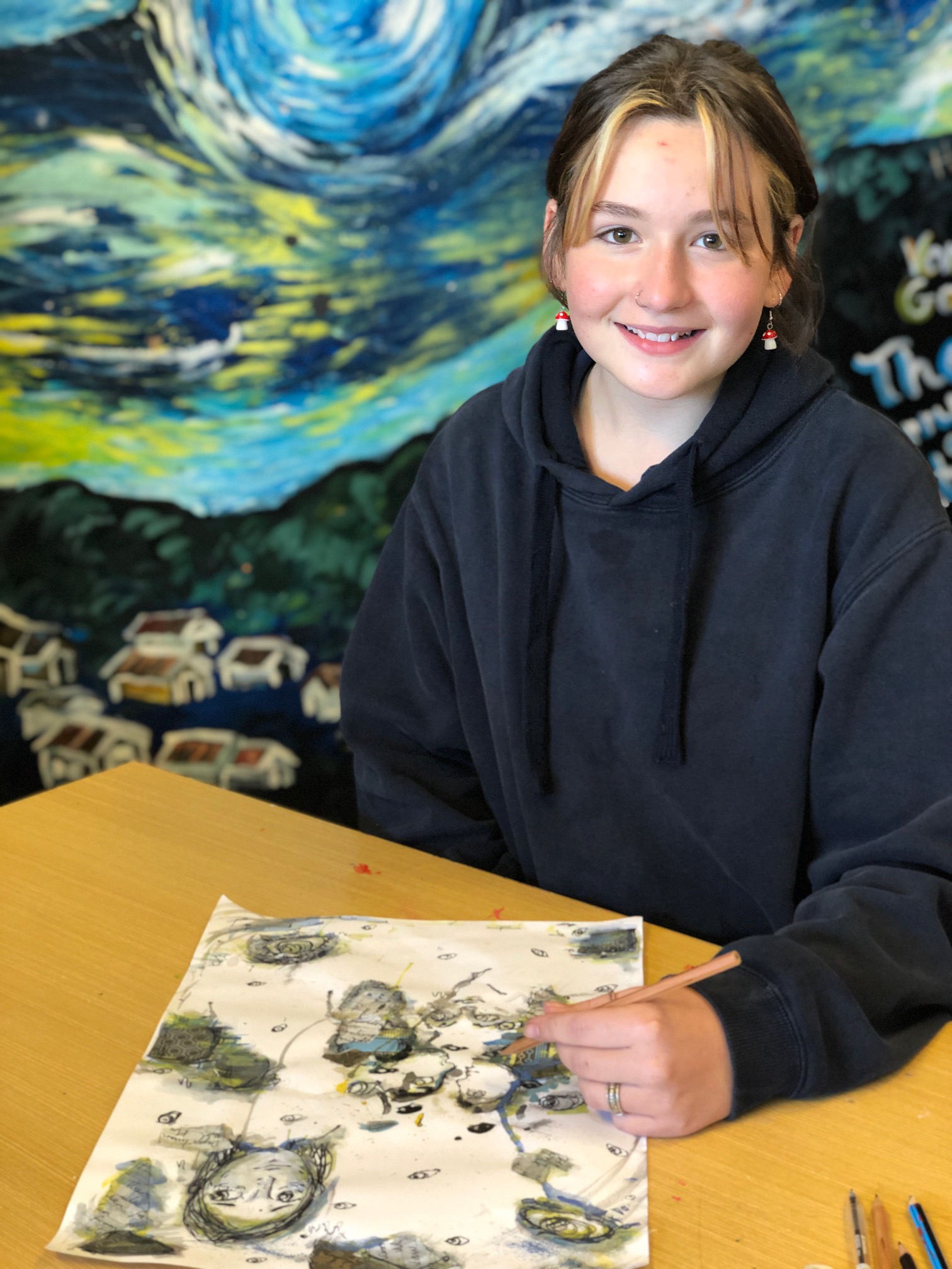 Jacky Ham with her artwork.