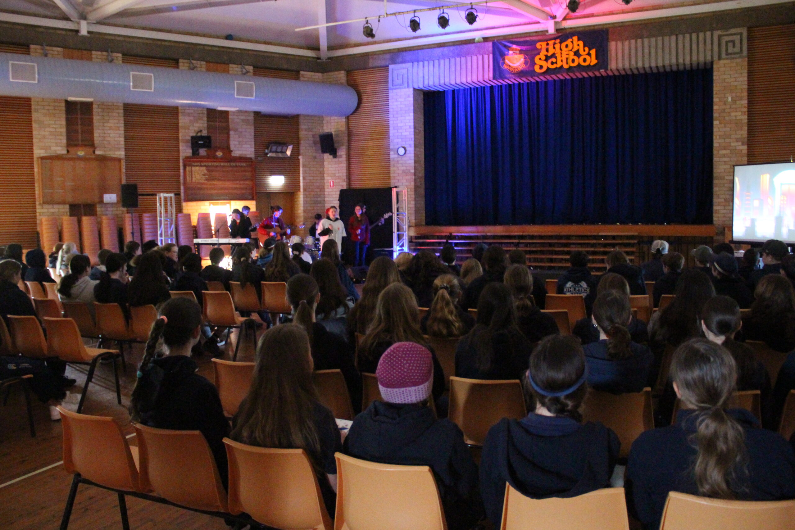Narrabri High students watching the performance at the school hall.