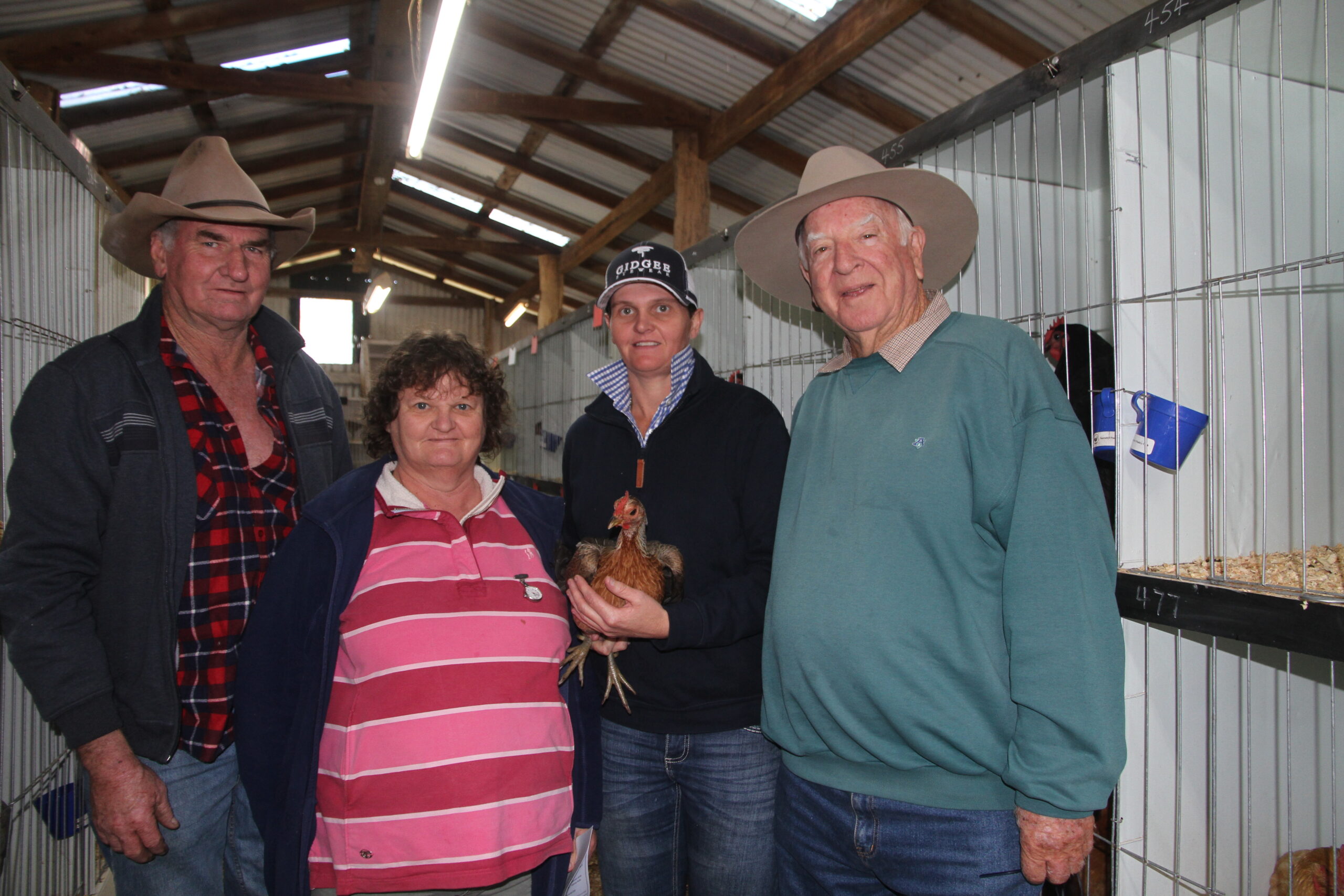 Gunnedah supporters of the Narrabri Poultry Show, Michael, Lynette and Nicole Smith, with Peter Smallpiece.