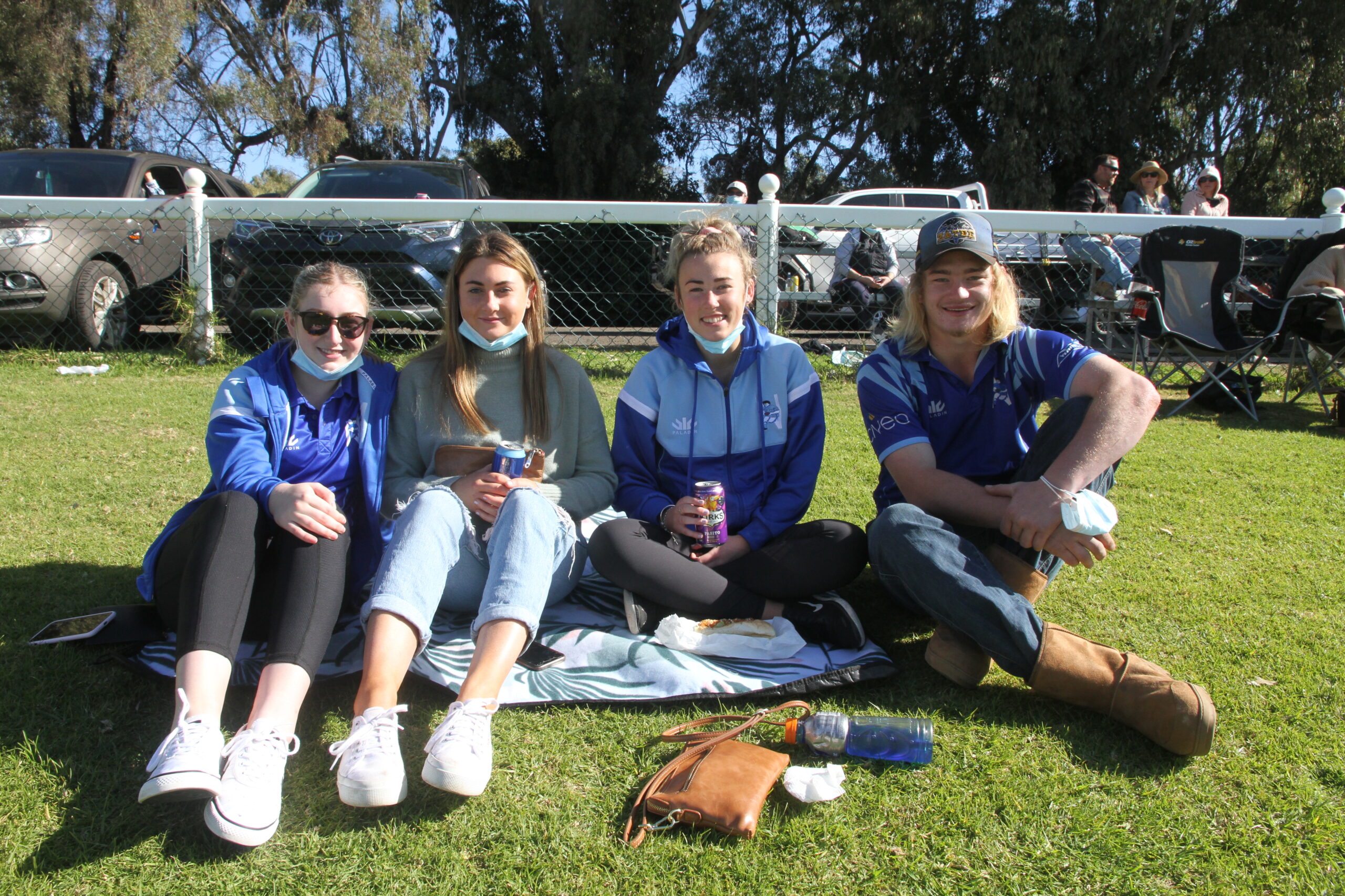 Ariarna Key, Amy Baguley, Taylah Fogarty and Kalab McMillan at Collins Park on Sunday to watch the rugby league.