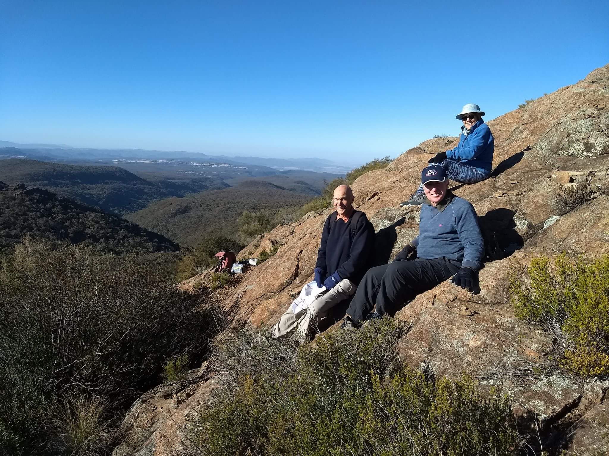 John Leculier, John McPherson and Jacqui Warnock high up on Yulludunida. The walking track is a challenging two-hour hike in Mount Kaputar National Park offering panoramic scenic views.