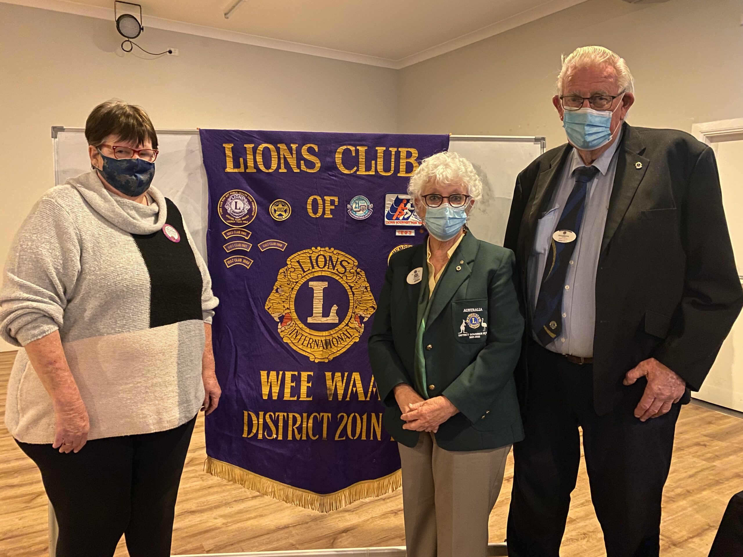 Lions Club president Julie Dowleans OAM who welcomed attendees and thanked the guests and members for their support, pictured with Lions 201n1 district governor Robin Parker and area development chair Bob Percival.