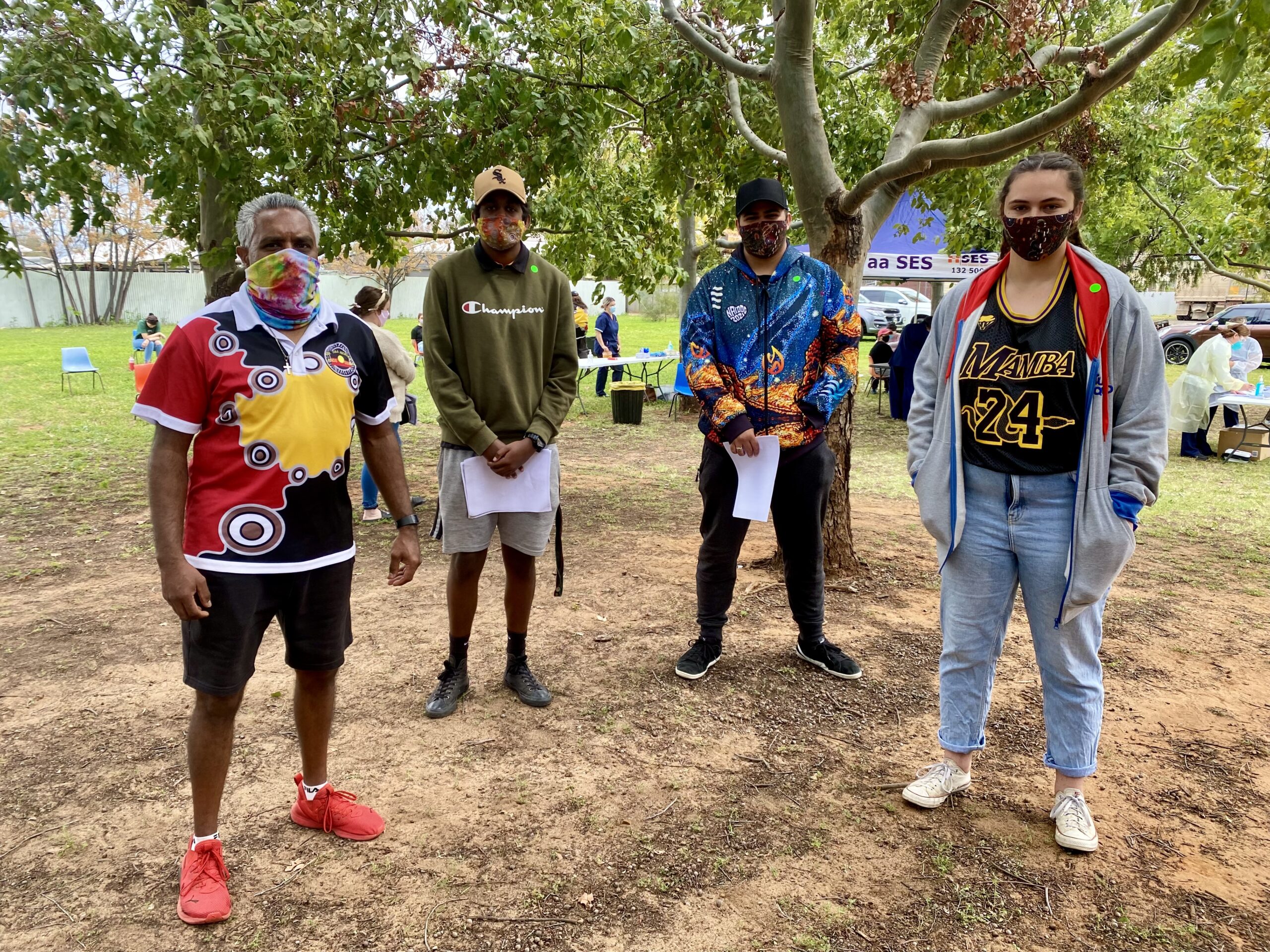 Wee Waa Local Aboriginal Land Council chair Clifford Toomey with his son Clifford Toomey Jnr and Jermaine Toomey and Vanessa Smallwood who all rolled up their sleeves to get the vaccination on Saturday.