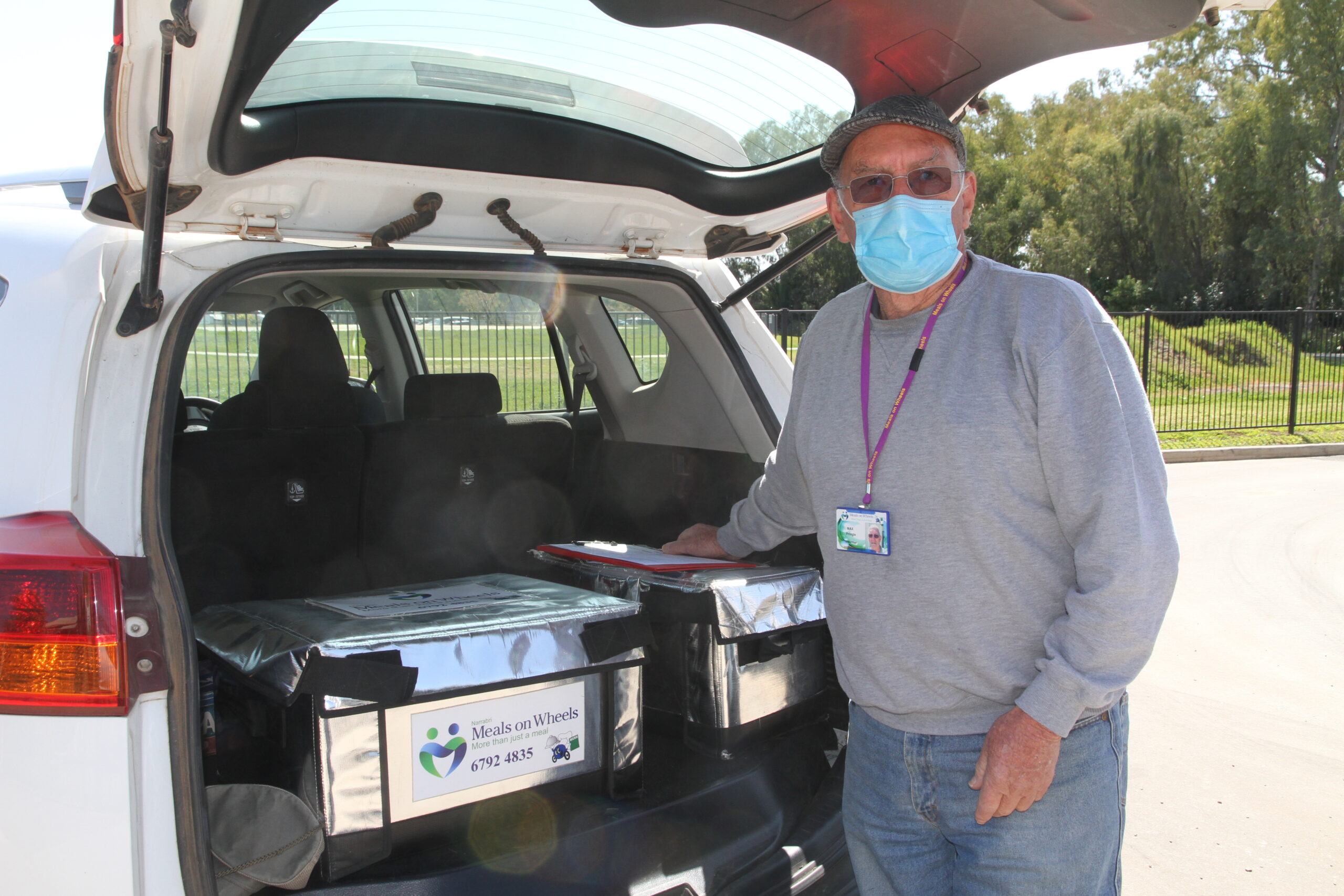 Max Pringle OAM loads meals into his car, ready to distribute across Narrabri. Max Pringle OAM loads meals into his car, ready to distribute across Narrabri.