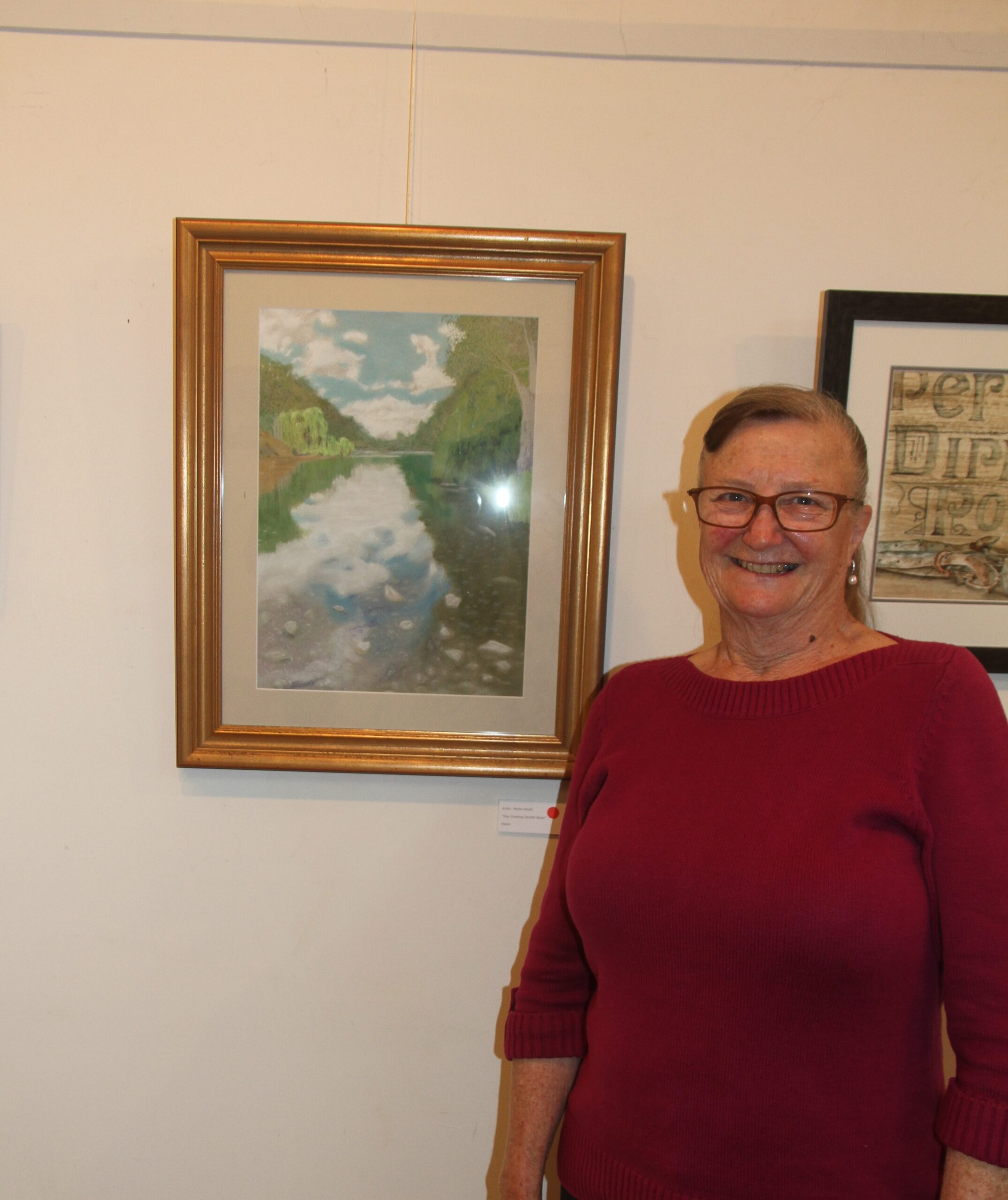 Helen Smith with her artwork ‘Top Crossing Gwydir River’, pastels.