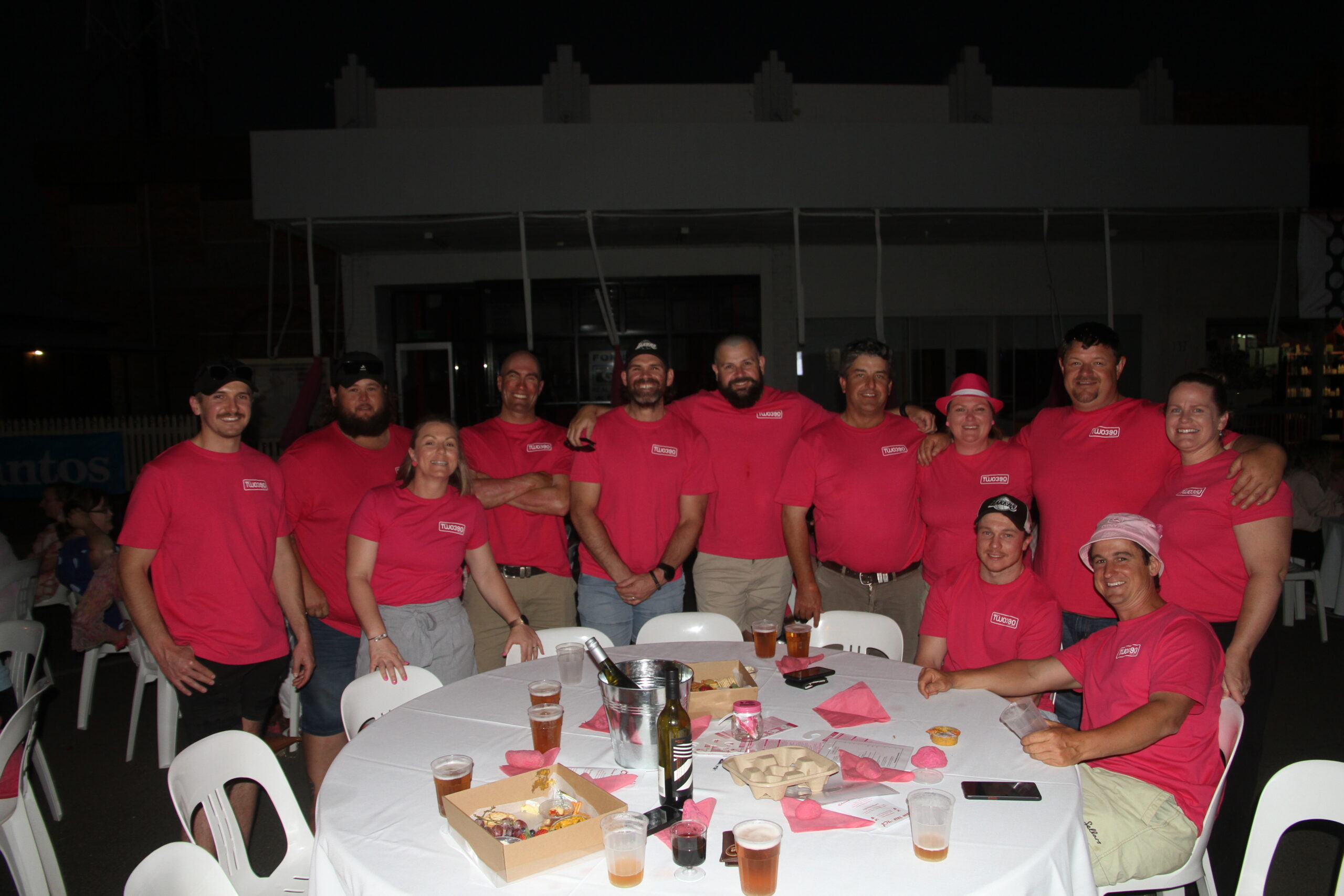 Resplendent in pink on Saturday night, the Phoenix 2390 Pink Up fundraiser supporters, from left, Luke Bailey, Jamie Woodin, Brendon Warnock, Lachlan Cameron, Aaron Stoltenberg, Cameron Lennox, Lisa Mullins, Todd Stanford and Sally Stoltenberg. Front, Megan Cameron, Sam Sadler and Andrew Mullins.