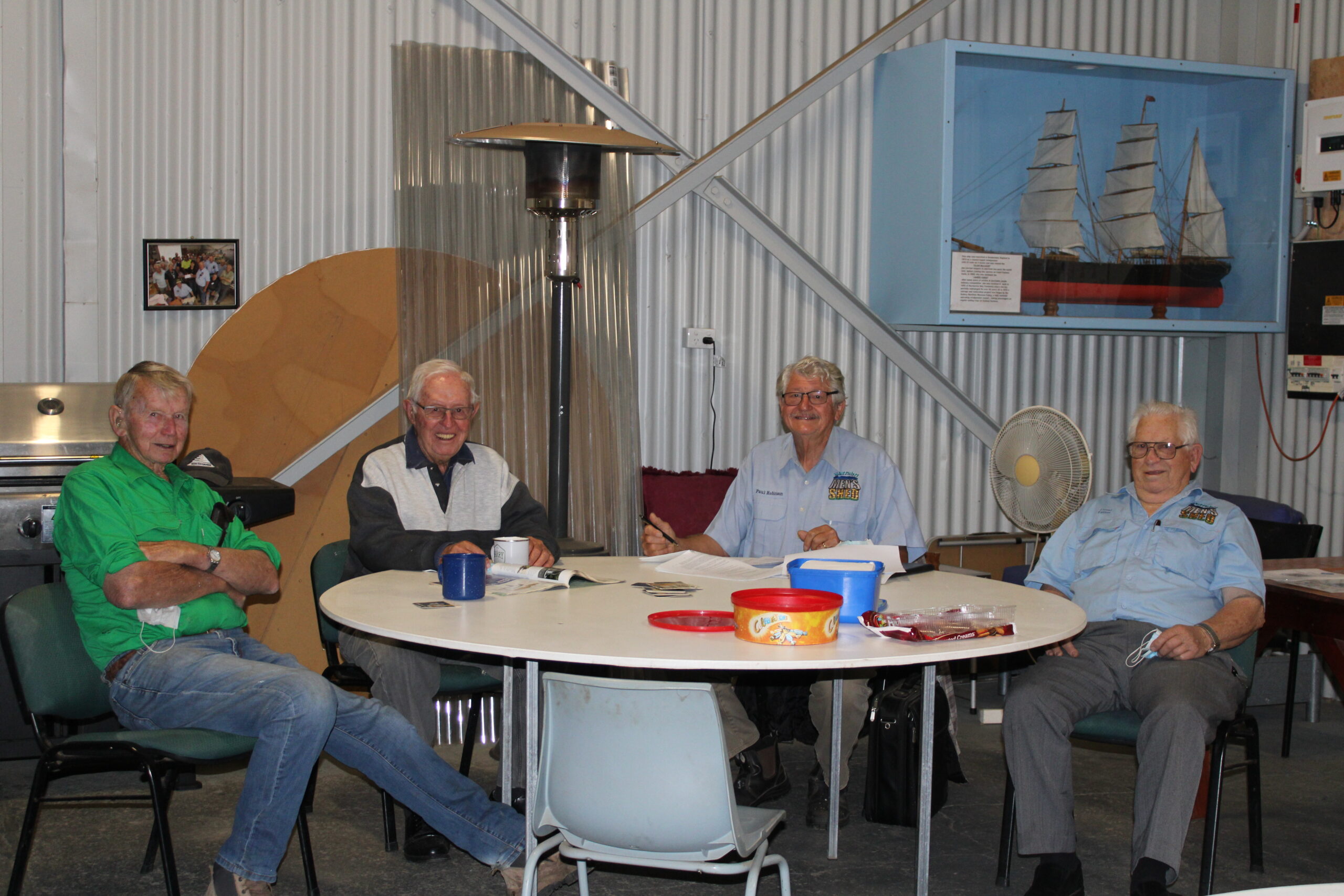 John Melbourne, Barry Shepherd, Paul Robinson and Lionel Palmer gathered around for tea and coffee at the Men’s Shed.
