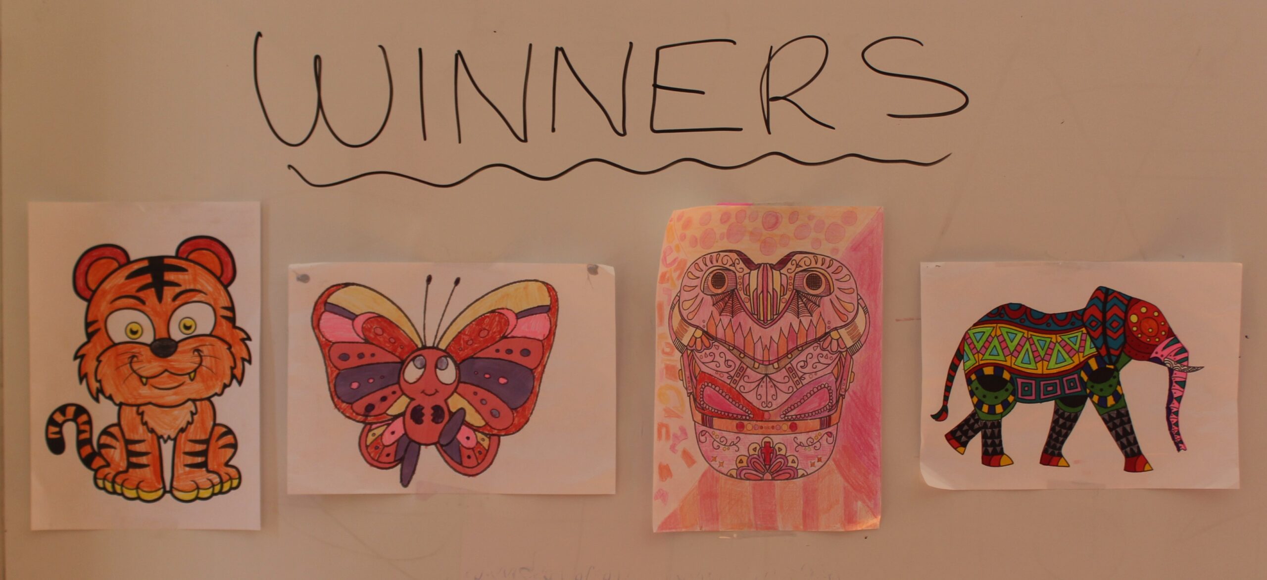 Winners of the colouring in competition: Hayley Carter (Kinder Boggabri Public School), Dougie Watson (Year 2 Boggabri Sacred Heart), Grace Groves (Year 3 Boggabri Sacred Heart) and Tom Watt (Year 6 Boggabri Sacred Heart School).
