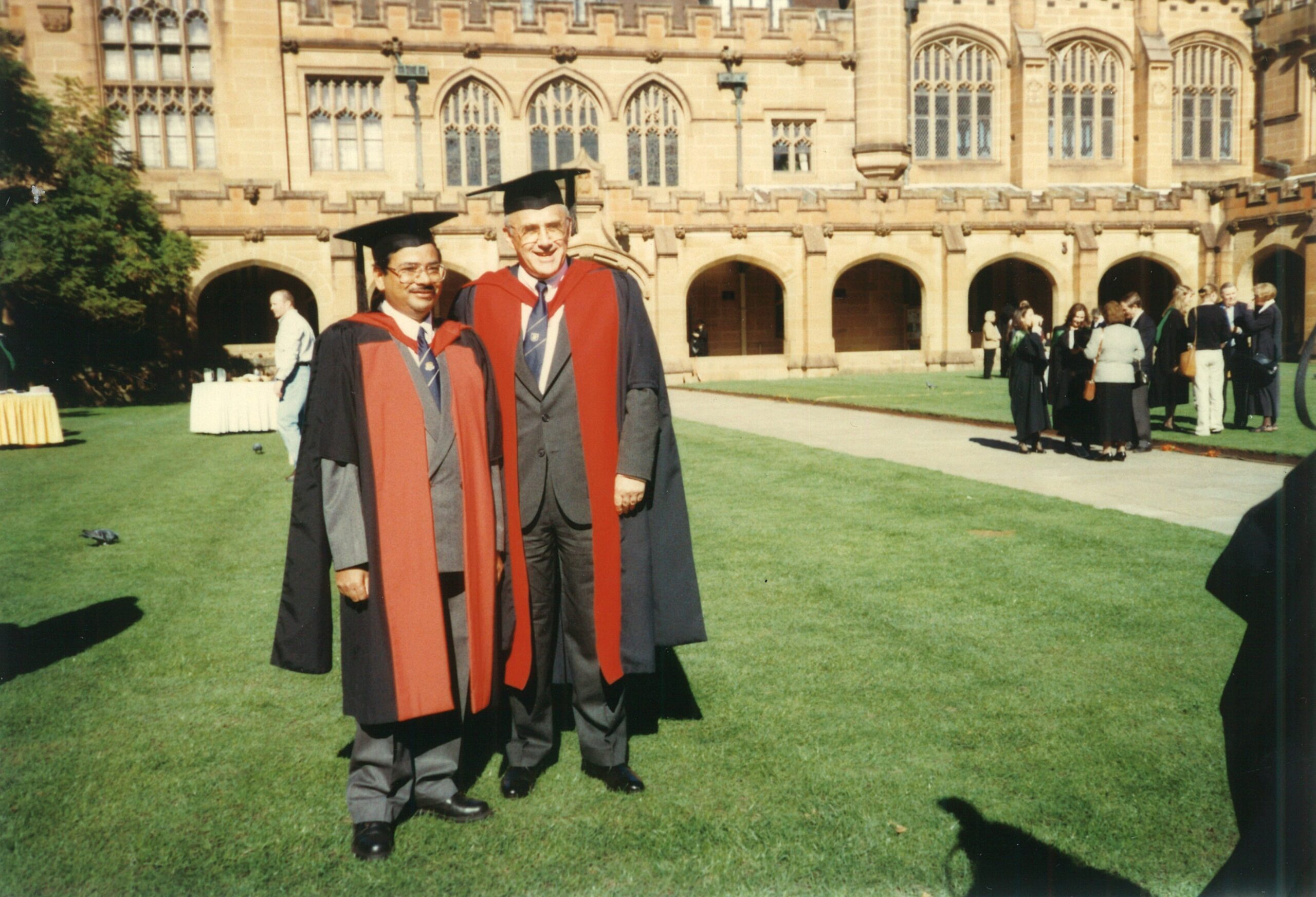 Kedar Adhikari accompanied by the Dean of Faculty of Agriculture during his graduation with the Doctor of Philosophy (PhD) from the University of Sydney.