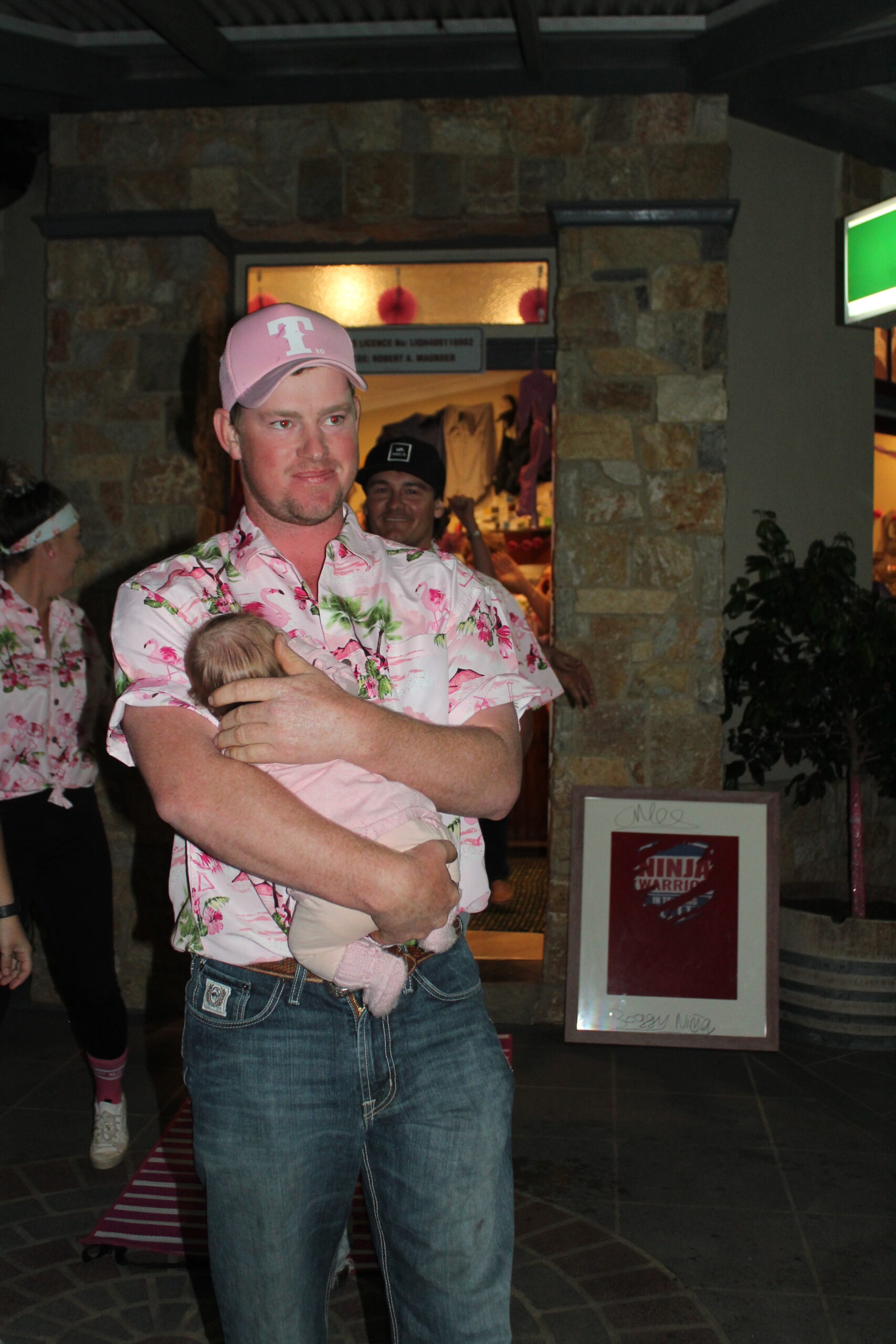 Baby Ruby Grumley and Hayden Grumley lead out the 15 members of the ‘Pink shirts’ at the Boggabri Pink Angel night held at the Baan Baa Hotel on Friday, October 8.