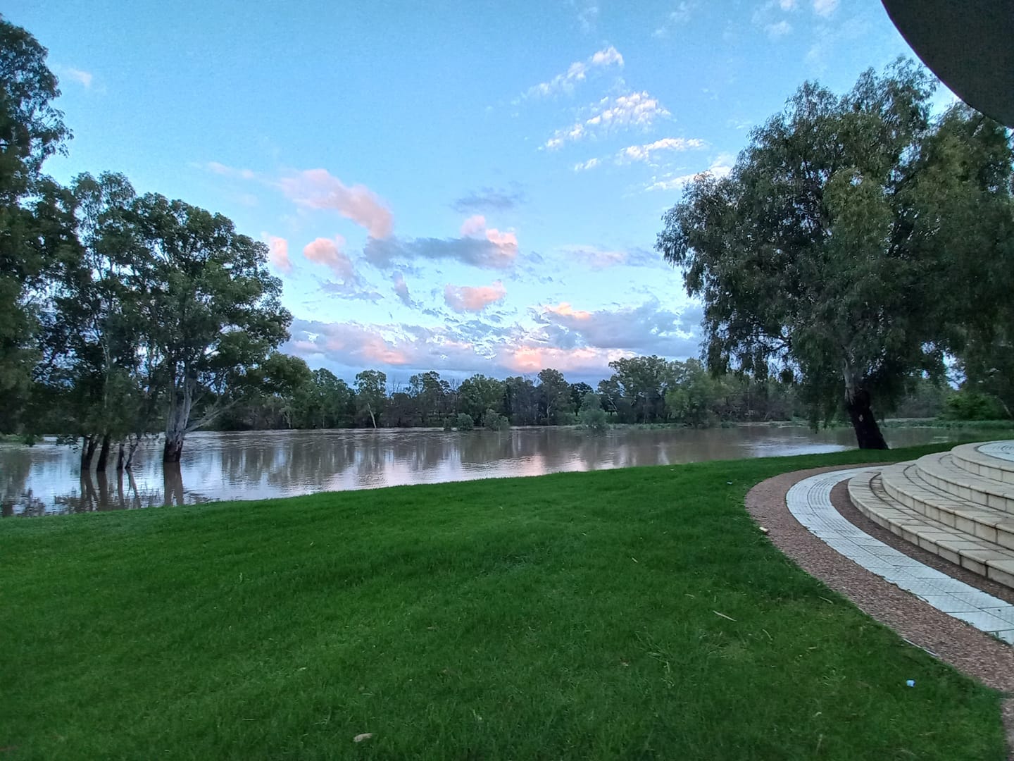 CREEK LEVEL RISES: The grassed area in front of The Crossing Theatre was partly covered by water as the Namoi River’s volume increased. Photo: Liza Barlow