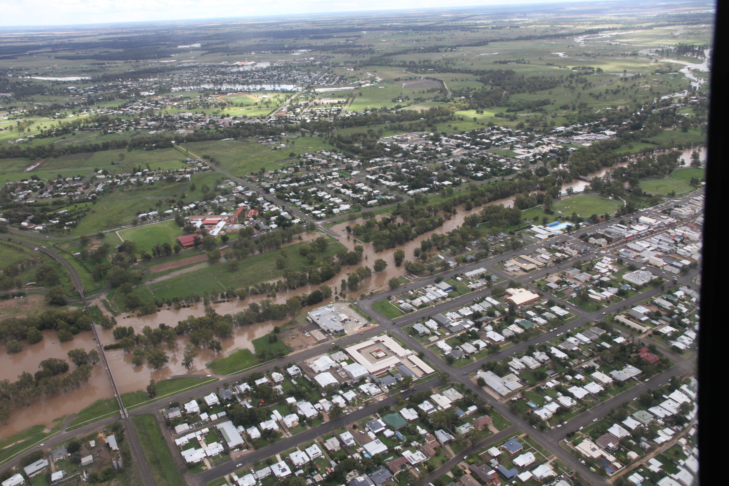 The swollen creek pictured from above on Friday afternoon.