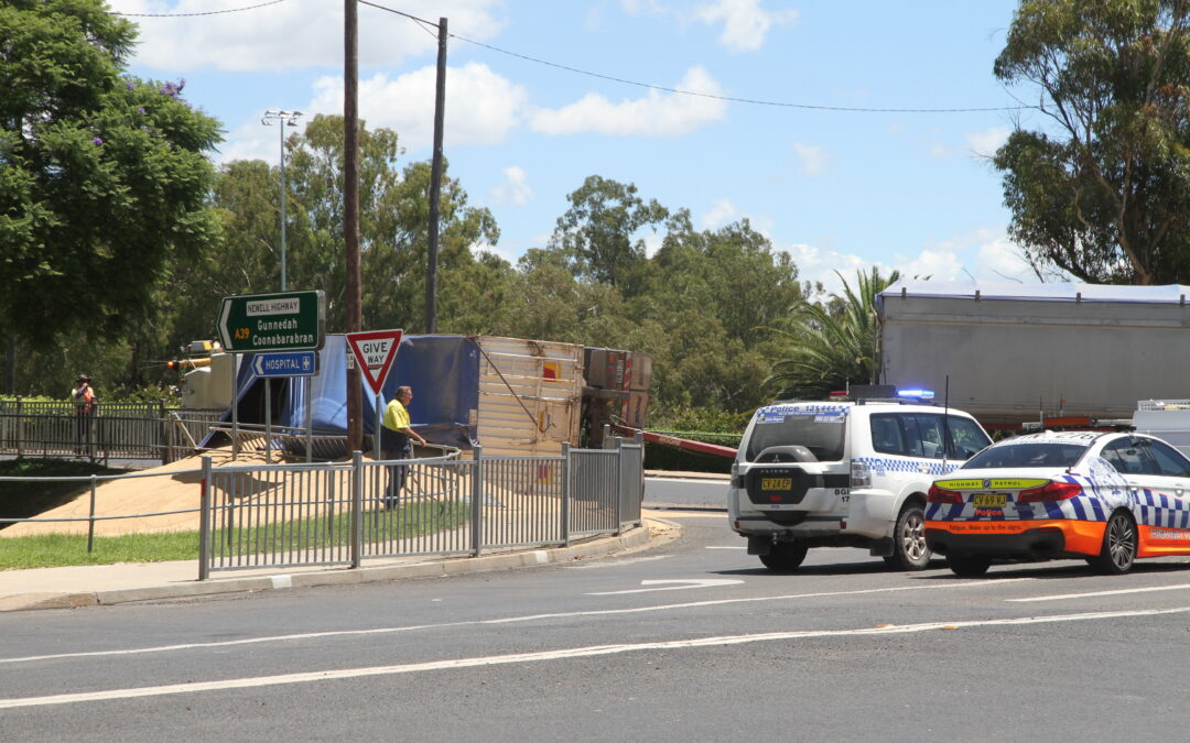 Truck roll-over forces creek bridge closure