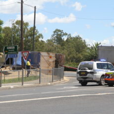 Truck roll-over forces creek bridge closure