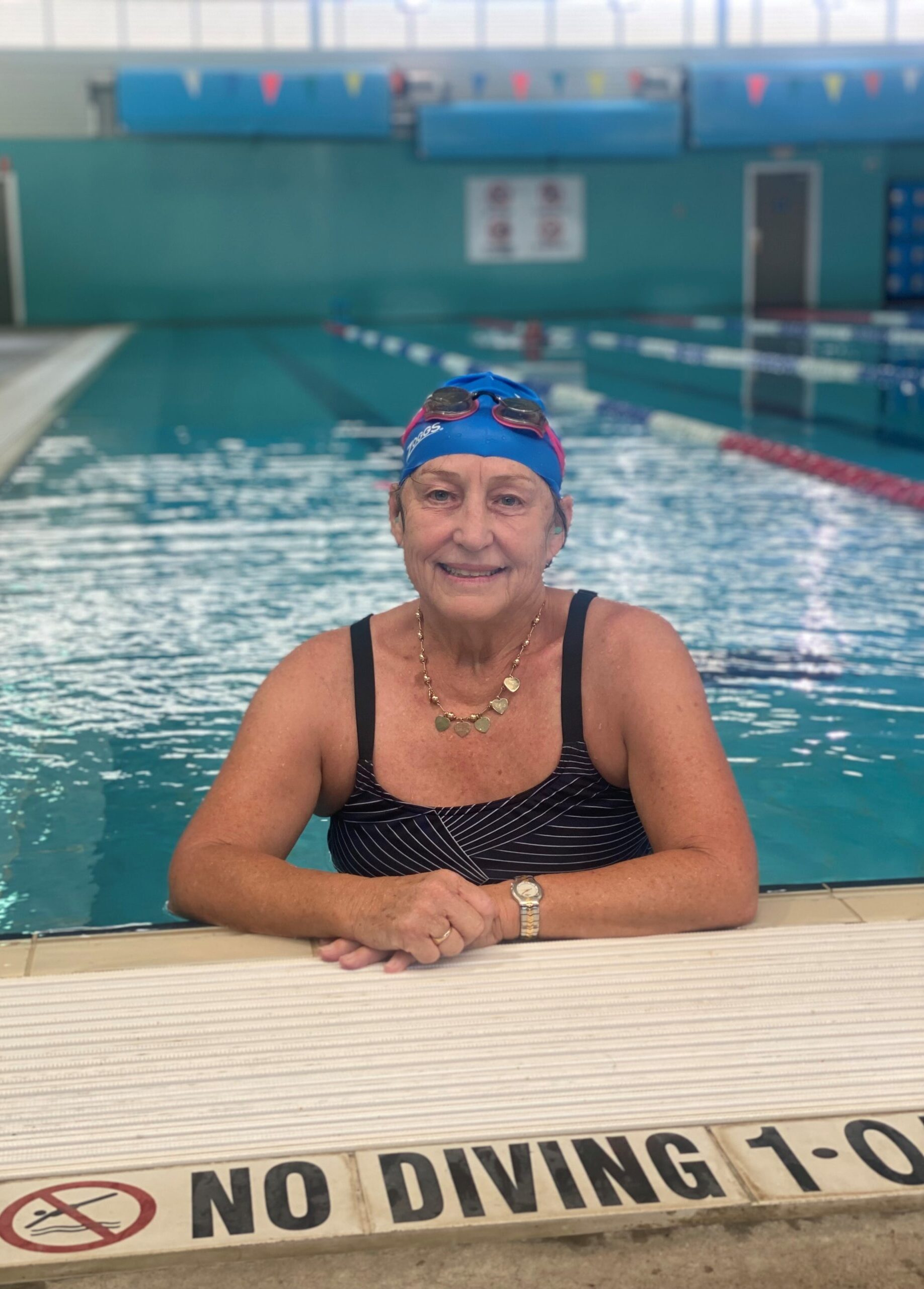 Helen Dugdale swimming laps to support youth mental health service ReachOut
