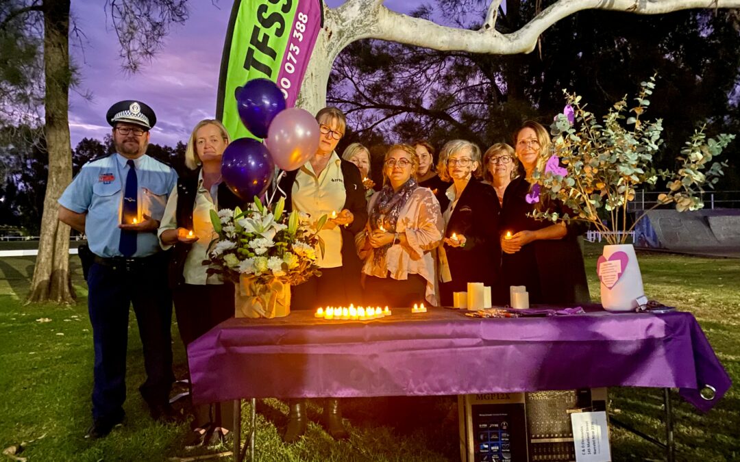 Community members gather to remember victims of domestic violence