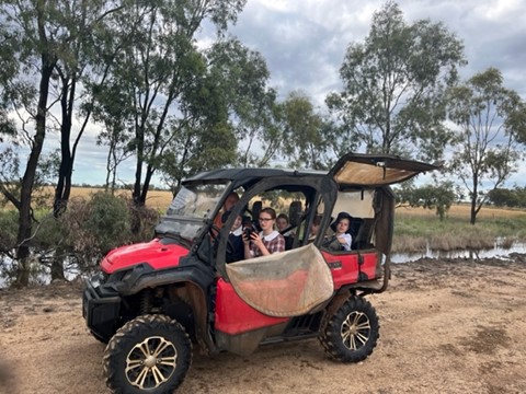 Burren Junction Public School relieving principal Kate Slack-Smith with daughter Sophie and her fellow BJPS students Emmy Moore, and Harry, Rachel and Maggie Powell on the school run during the recent floods.