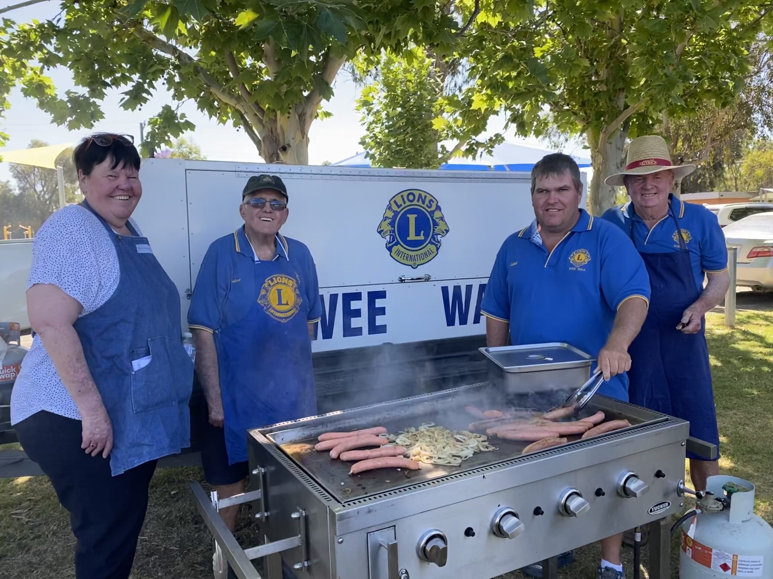 Wee Waa Lions Club members provided a delicious barbecue at the Wee Waa High School redevelopment community update. Pictured Julie Dowleans, Rob Downey, Jamie Copelin and Bruce Gray.
