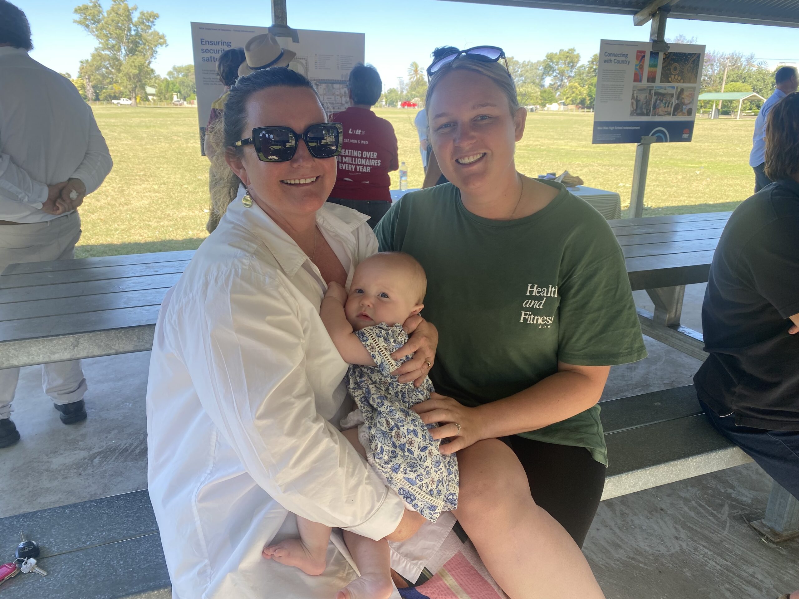 Leisa O’Shea holding Charlotte Johnson, and Charlotte’s mum Jordan.