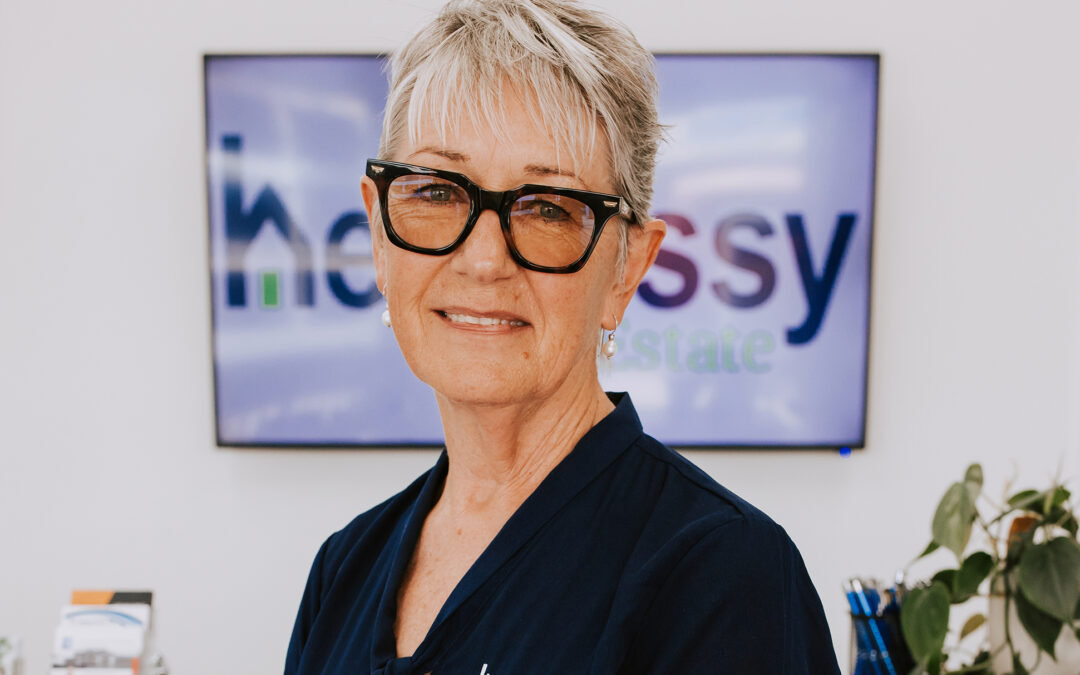 Friendly, familiar face ready to welcome you at Hennessy Real Estate